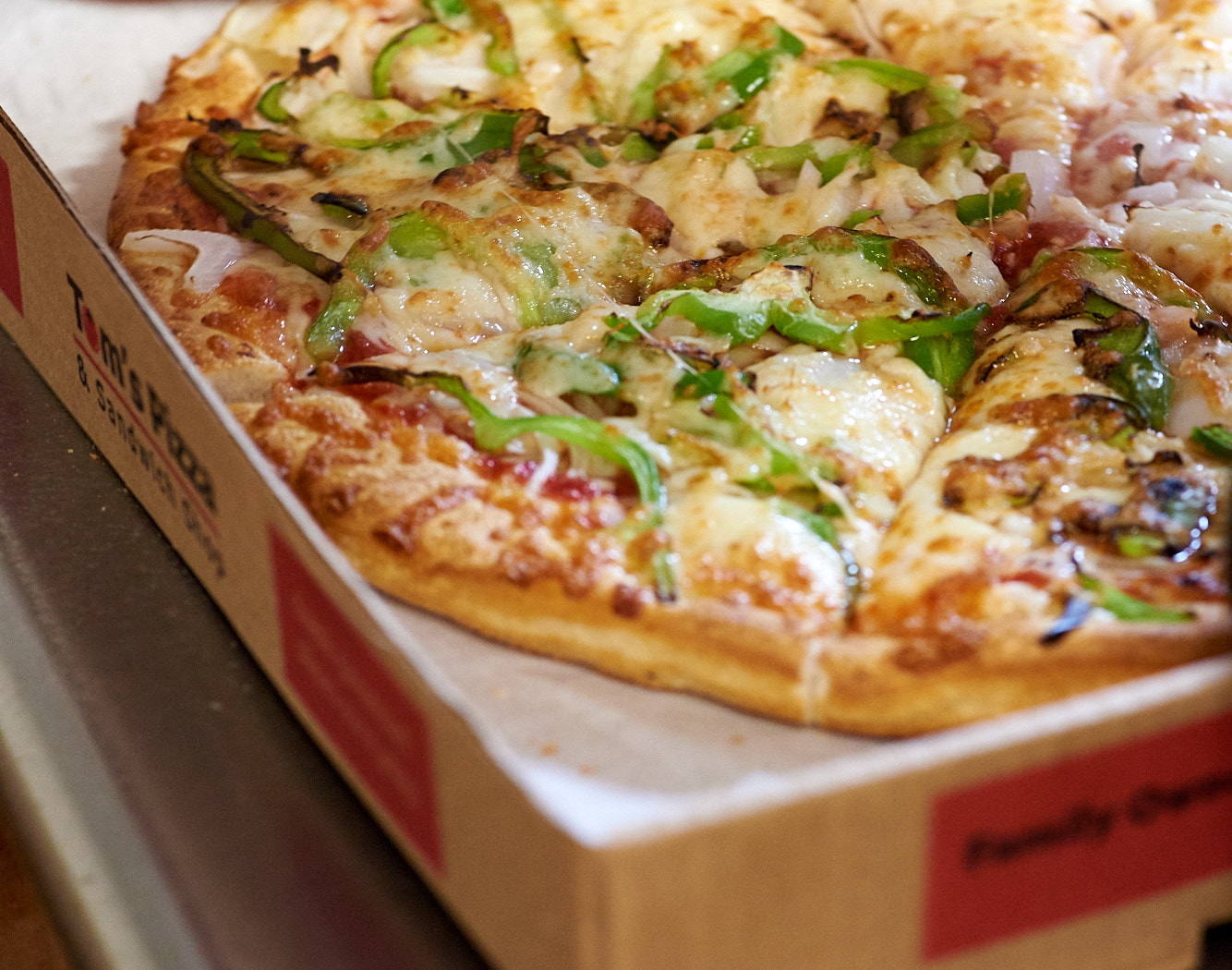 Tom's Pizza Peppers , Mushrooms, Onions Combo